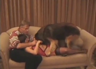 Threesome scene with a dog that fucks everyone