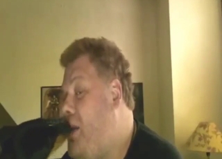 Chubby blonde guy rams his tongue in dog